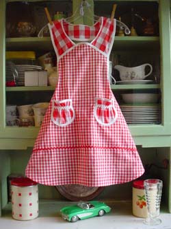Front of 1940 child apron in red gingham